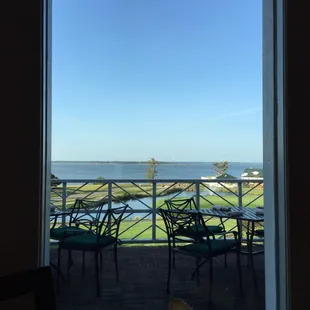 a view of the ocean from a restaurant