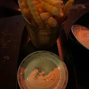 Fries and dipping sauce comes with the cod