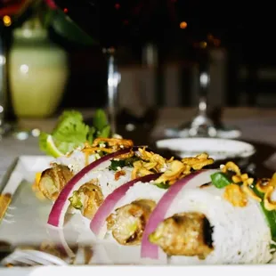 a plate of food and a glass of wine