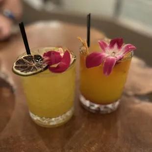 two cocktails on a table