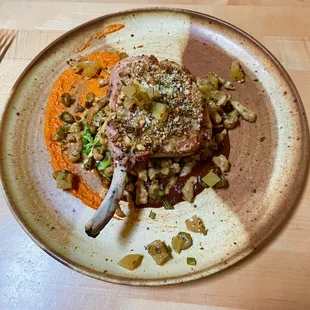 a plate of food on a wooden table