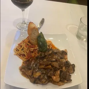 Chicken with pasta and mushrooms.