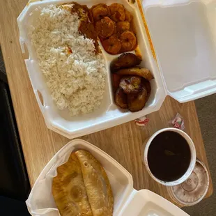 a tray of food and a cup of coffee