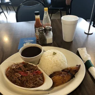 Ropa Vieja  White Rice Black Beans  PLATANOS MADUROS  SWEET FRIED PLANTAINS)