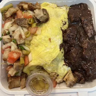 Dinuguan, lechon kawali, pork adobo fried rice omelet. Pickled ong Choi. Delicious!