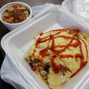 Pork adobo fried rice omelette with a side of special lechon. It was yuuuge.