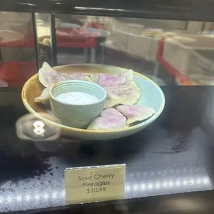 Cherry pierogies (vareniki) in the cafe