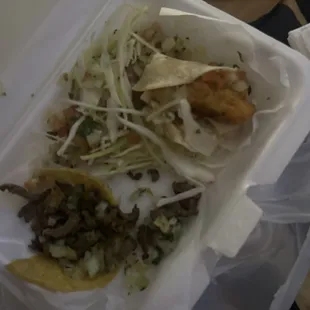 Steak taco left fish taco right