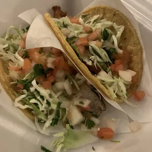 Grilled fish taco on left and fried fish taco on right
