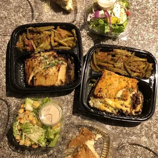 Mousaka, Pastitsio, Greek and Caesar side salads, and Baklava Cheesecakes