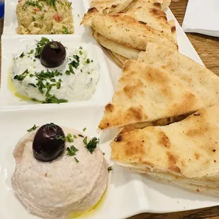 Any 3 Dips ( from the bottom: taramasalata,tzatziki,eggplant spread)