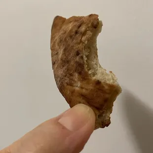 The host&apos;s explanation to this: &quot;this is not a bite mark, it&apos;s the tongs that ripped out a piece when we pull the bread out of the oven.&quot;