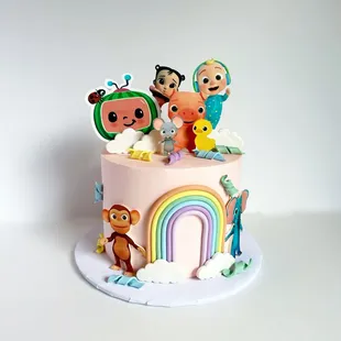 a cake decorated with cartoon characters