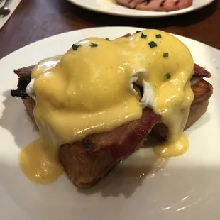 Egg'n Apples Benedict on French Toast, with Maple Syrup and Bacon - delish!  Two Eggs any style, with Home Fries and ham in the back