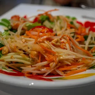 Papaya salad spicy, very flavorful served with good heat as requested