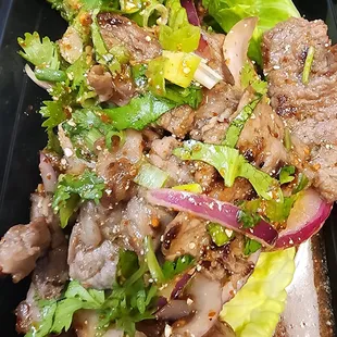 Num Tok
grilled beef in spicy sauce, roasted rice, cilantro and spices. This spicy salad makes a good combo with sticky.