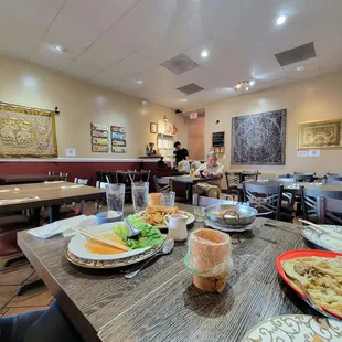 View of the dining room from our table. The cash register is straight ahead. The restrooms are past the cash register, down the hallway.