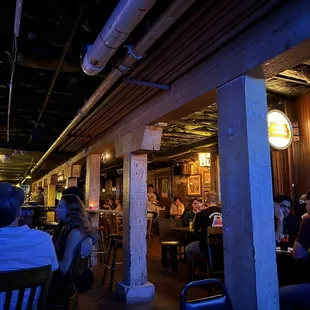 a group of people sitting at tables
