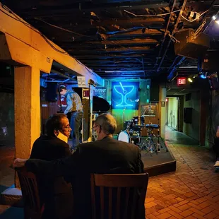 a group of people sitting at a table