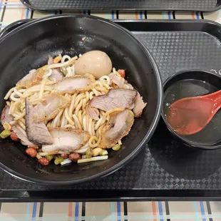 A2 Guilin rice noodle with marinated beef and crispy pork after mixing up the sauce ($12.95)
