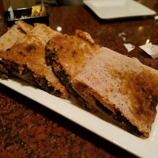 Ayib Begomen dried curds of Ethiopian cheese with collared greens and red peppers...sooo good!! Great vegetarian options