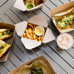 a variety of sandwiches and french fries