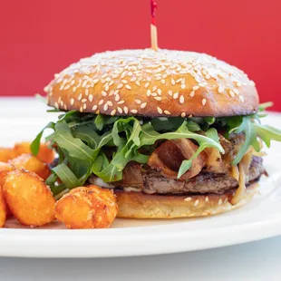 Bistro burger with bacon-onion compote, blue cheese, and arugula