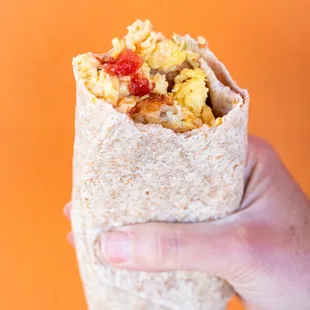 Rise and dine with us. We offer two varieties of breakfast burrito every day.