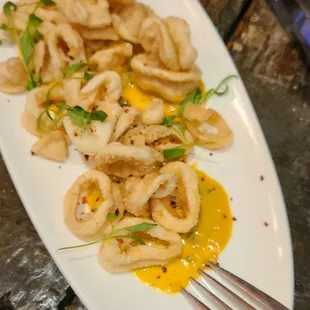 Great happy hour here for apps and drinks except these dried calamari rings