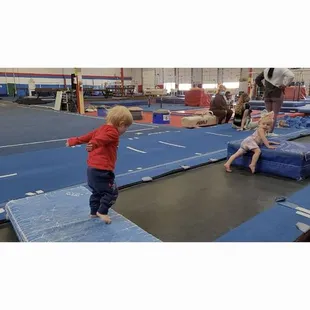 Andrew preparing for a jump, following the girls. Parent participation class.