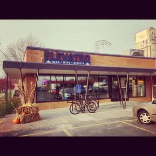two bicycles parked outside of a building