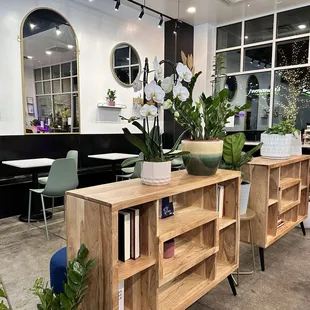 a coffee shop with tables and chairs