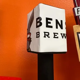 a sign for ben brew