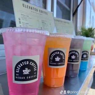 a variety of drinks on a counter