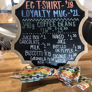 Here is a small side menu with drinks for kids, retail coffee options, and Elevated Grounds apparel menu!