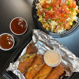  a meal of fried tofu and a side of salad