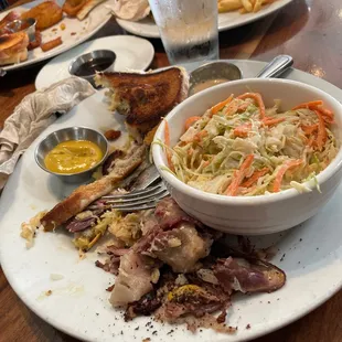 Reuben sandwich and coleslaw.