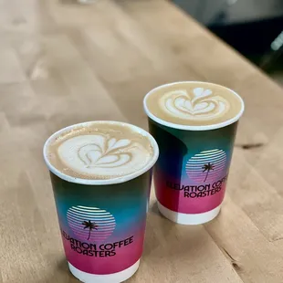 Oat Milk Lattes with one with Cinnamon Toast Crunch Syrup and one with Toffee Almond