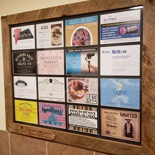 a display of business cards on a wall