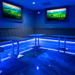 a view of a pool with a tv in the background