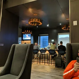 a man sitting at a table in a restaurant