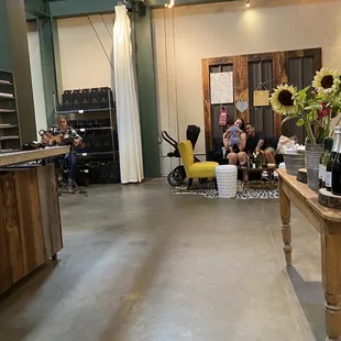 a group of people in a tasting room