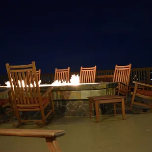 Crazy fire pit with rocking chairs.