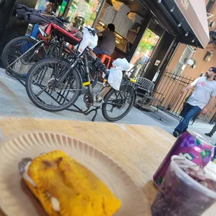 a plate of food and a drink on a table