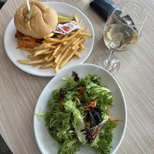 Fish sandwich, fries, and salad
