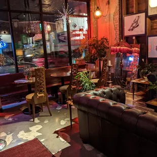 a living room with leather furniture