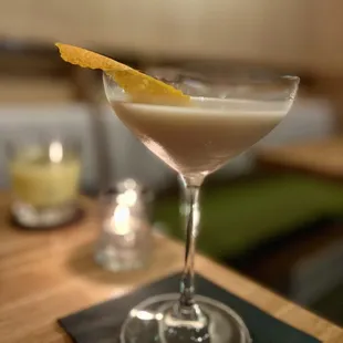 Le PARISIAN: worthy park 109 rum, koloa white rum, cointreau, citrus oleo saccharum, fight cream