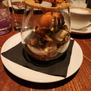 La Pistache  cardamom cake, banana cream, pistachio cookie, cardamom ice cream, orange caramel, banana butter