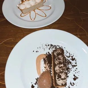two plates of dessert on a wooden table