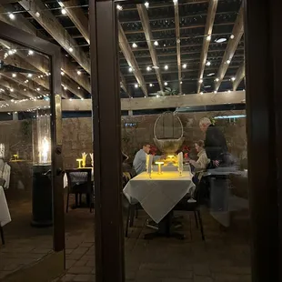 people sitting at a table in a restaurant